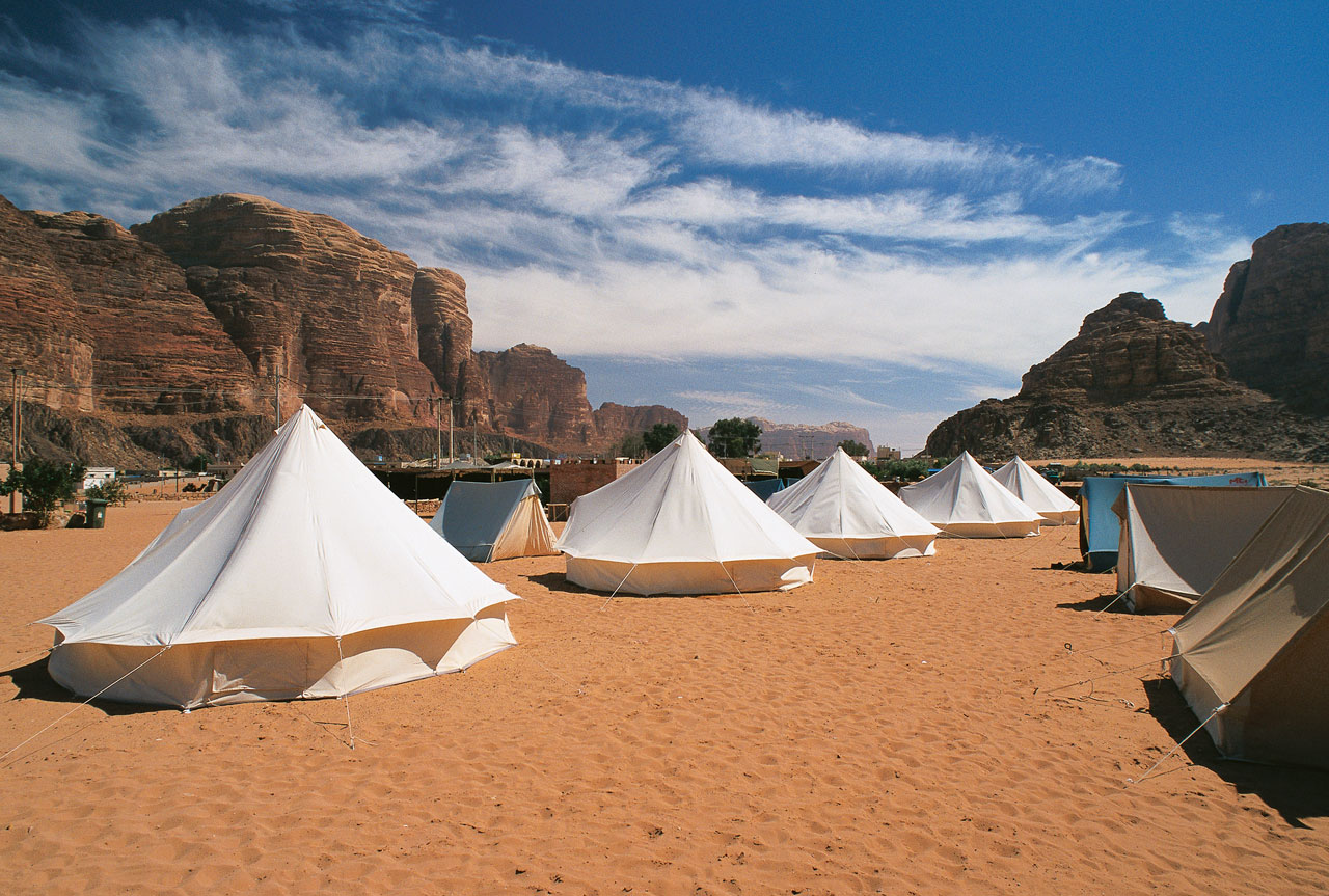 Welcome to the Valley of the Moon, the largest and most famous wadi in Jordan. With its sandstone and granite rock formations breaking through soft red sands, Wadi Rum is the most spectacular natural site of Jordan.